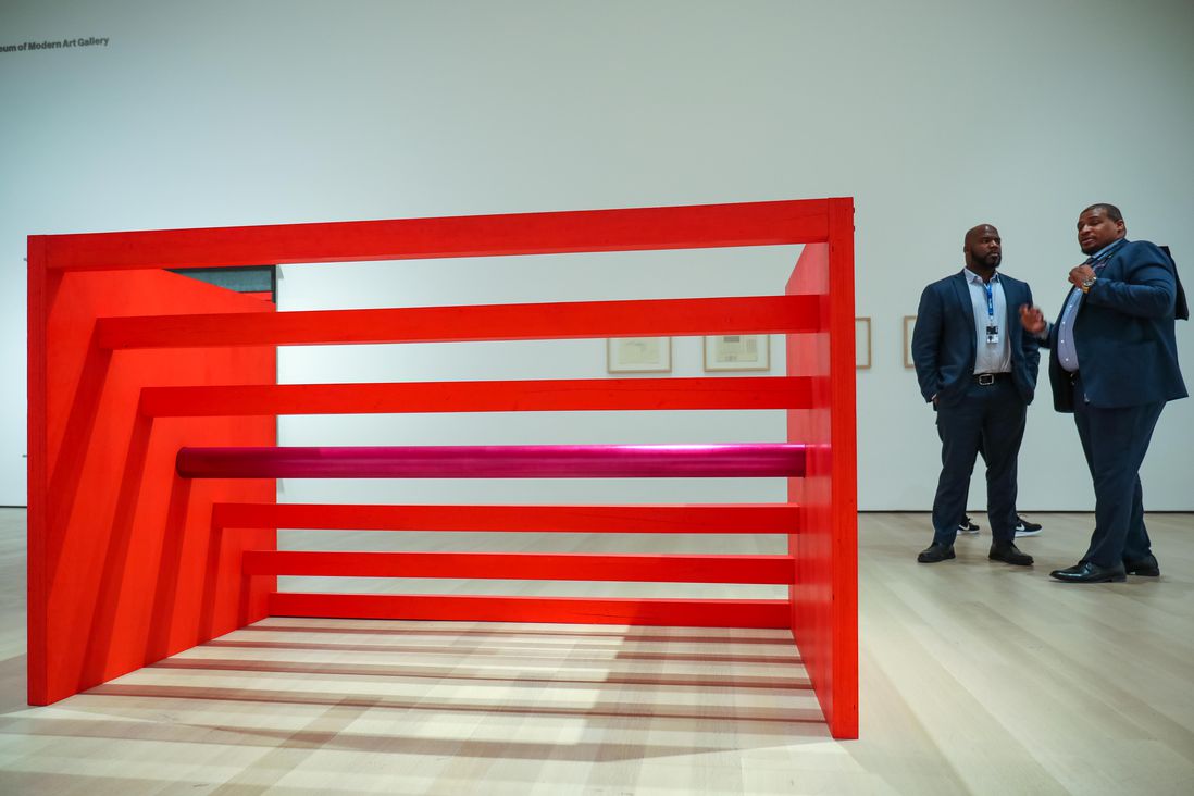 A red block piece by donald judd